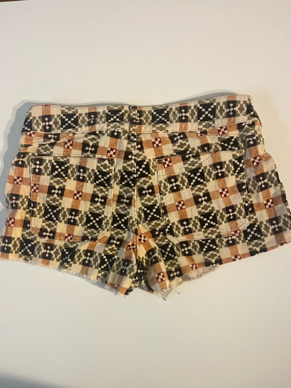 Pilcro | Anthropologie The Wanderer Low Rise Raw Edge Corduroy Geometric Shorts